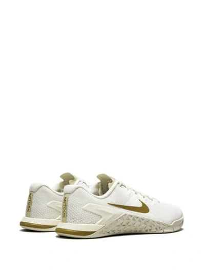 Shop Nike Wmns  Metcon 4 Chmp Sneakers - Neutrals