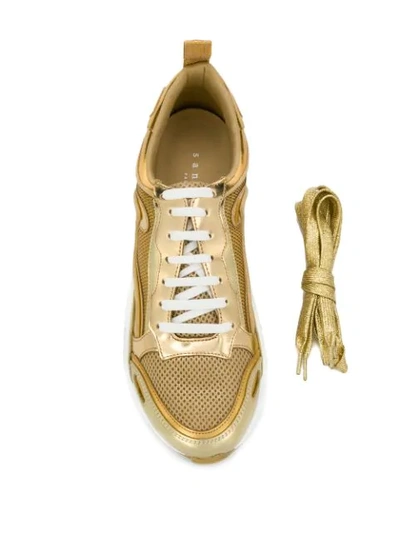 Shop Sandro Flame Sneakers In Gold