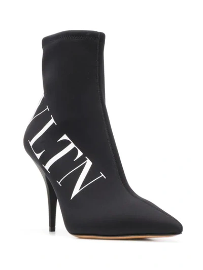 Shop Valentino Vltn Boots In Black