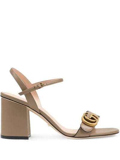 Shop Gucci Gg Logo Plaque Sandals In Brown