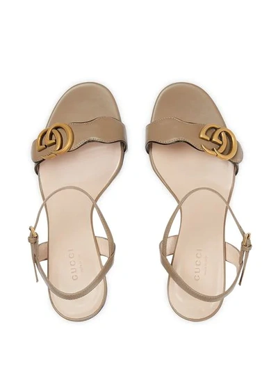 Shop Gucci Gg Logo Plaque Sandals In Brown