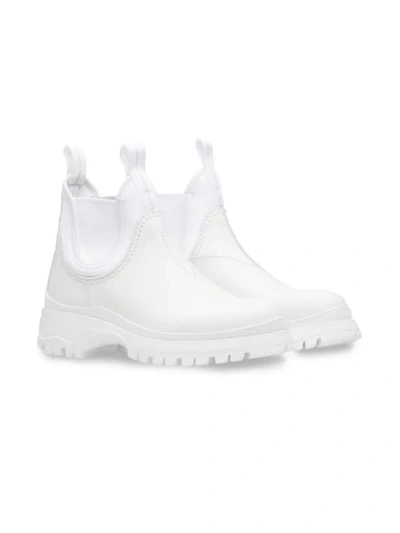 Shop Prada Round Toe Ankle Boots In White