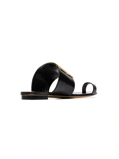 Shop Givenchy Black 4g Flat Leather Buckle Sandals