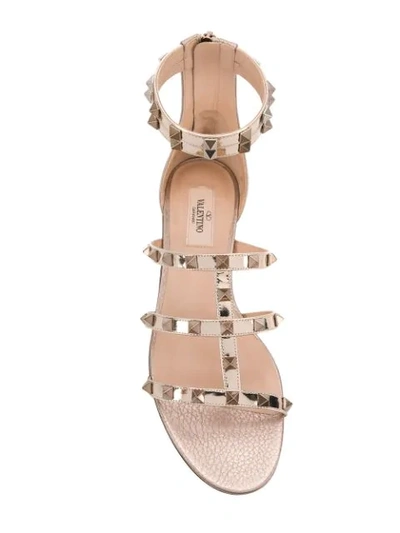 Shop Valentino Garavani Rockstud Sandals - Gold