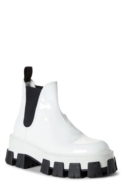 Shop Prada Lug Chelsea Monolith Boot In White Patent