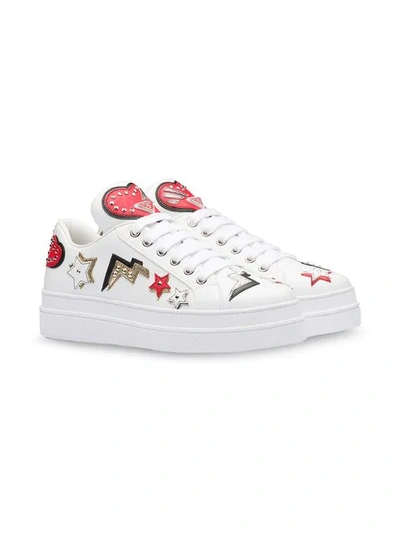 Shop Prada Hearts Patch Sneakers In White
