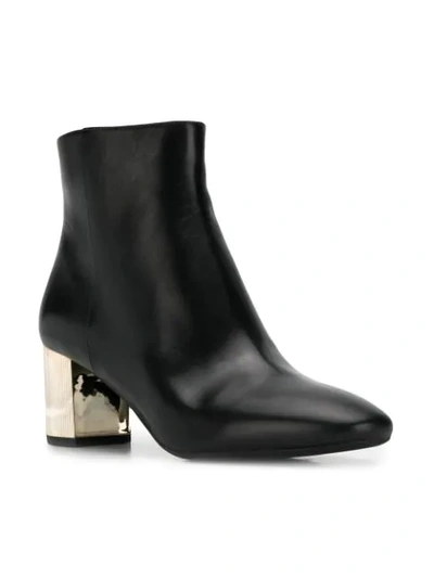 Shop Michael Kors Metallic Heel Ankle Boots In Black