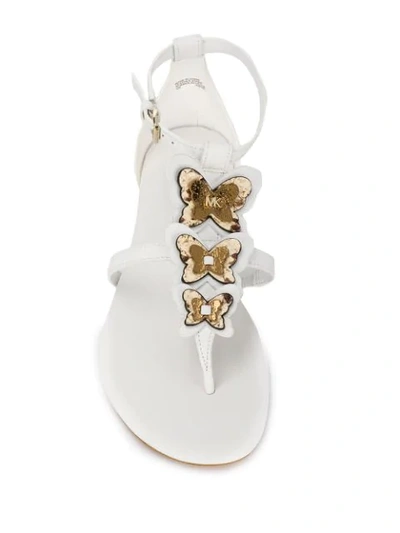 Shop Michael Michael Kors Butterfly Appliqué Thong Sandals In White