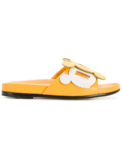 Shop Anya Hindmarch Circulus Slides In Yellow