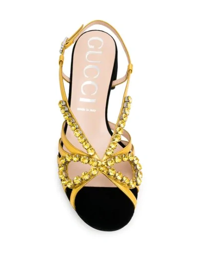 Shop Gucci Bow Detail Sandals In Gold