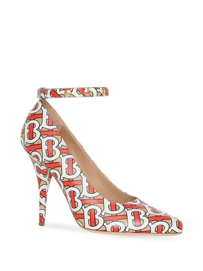 Shop Burberry Tb Monogram Print Pumps In Orange