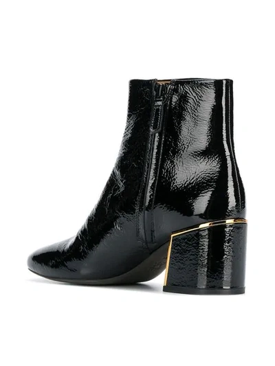 Shop Tory Burch Gold-tone Appliqué Ankle Boots In Black