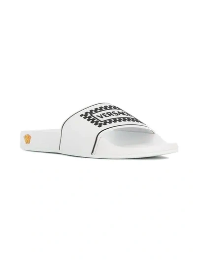 Shop Versace Logo Pool Slides In White