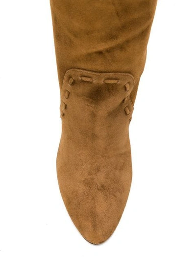 Shop Saint Laurent Meurice Tasseled Boots In Brown