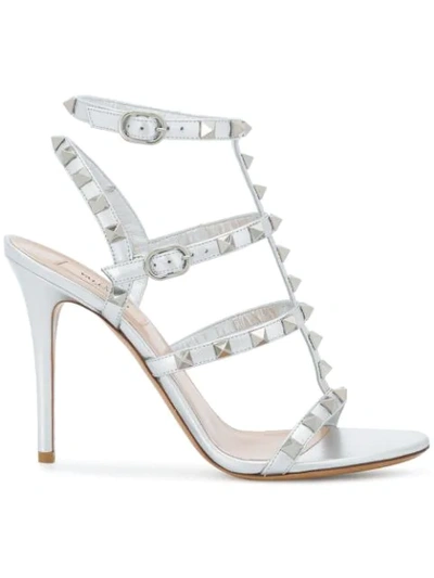 Shop Valentino Rockstud Sandals In Metallic