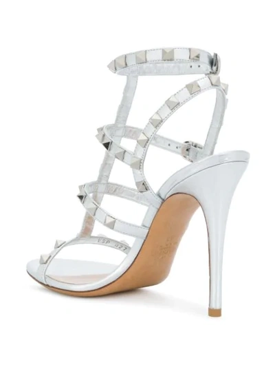 Shop Valentino Rockstud Sandals In Metallic