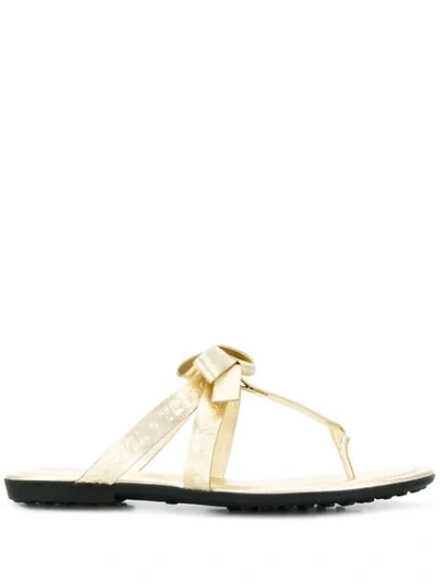 Shop Tod's Toe Post Sandals In Gold