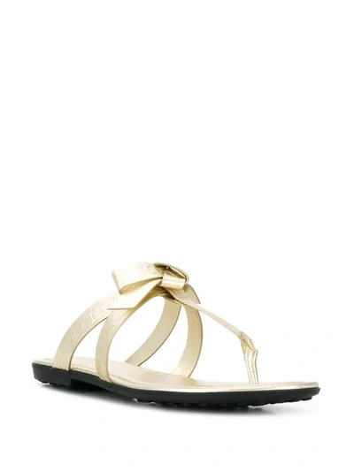 Shop Tod's Toe Post Sandals In Gold