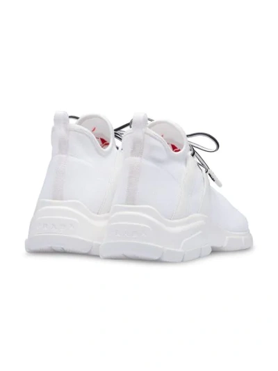 Shop Prada Knit Sneakers In White