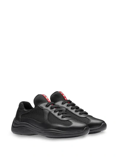 Shop Prada Leather And Fabric Sneakers In Black