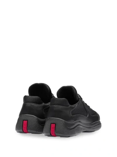 Shop Prada Leather And Fabric Sneakers In Black