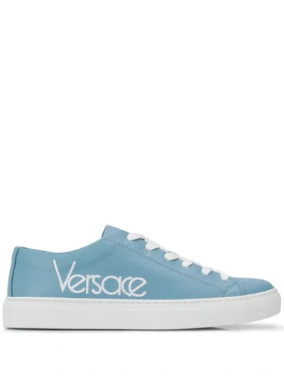 Shop Versace Logo Embroidered Sneakers In Blue
