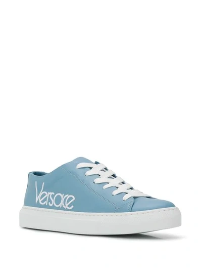 Shop Versace Logo Embroidered Sneakers In Blue