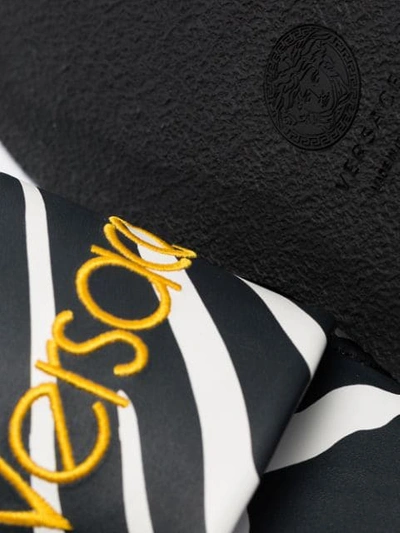 Shop Versace Logo-embroidered Zebra Slides In Black
