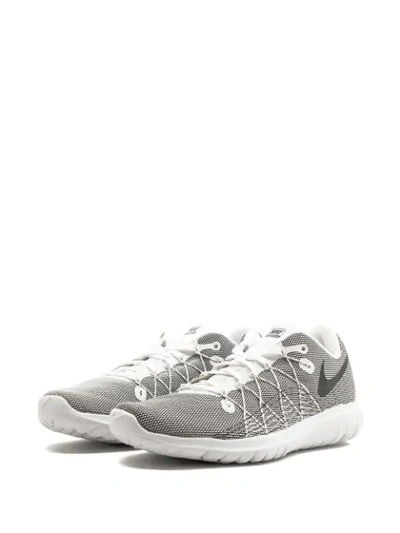 Shop Nike Flex Fury 2 Sneakers In White