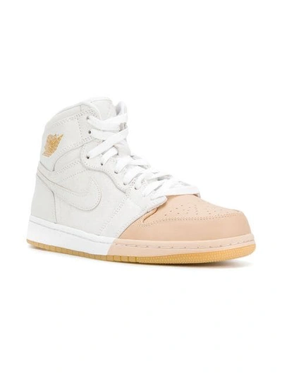 Shop Jordan Air  1 Retro Sneakers In White