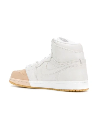 Shop Jordan Air  1 Retro Sneakers In White