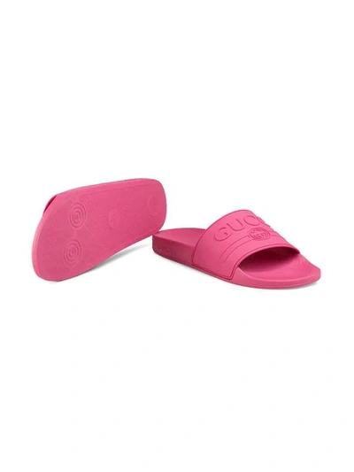 Shop Gucci Logo Rubber Slide Sandals In Pink