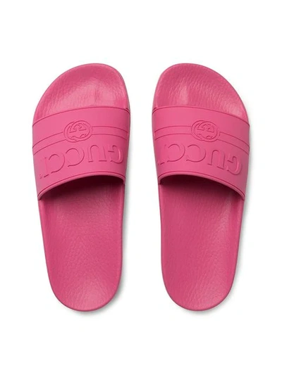 Shop Gucci Logo Rubber Slide Sandals In Pink