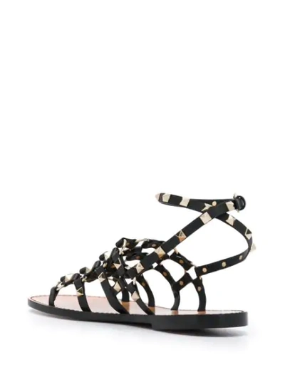 Shop Valentino Garavani Rockstud Caged Sandals In Black