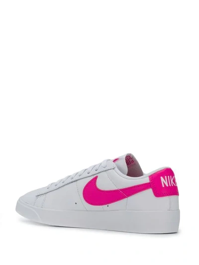 Shop Nike Blazer Low Le Sneakers In White