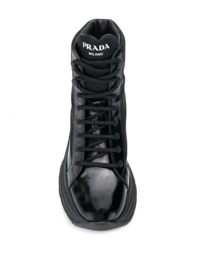 Shop Prada Stiefel Mit Plateau In Black