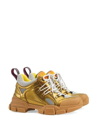 Shop Gucci Flashtrek Leather Sneakers In Gold
