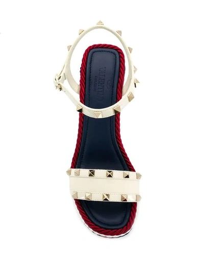 Shop Valentino Garavani Rockstud Wedge Sandals In White