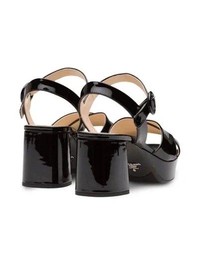 Shop Prada Crossover Strap Sandals In Black