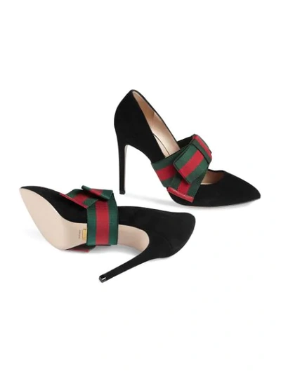 Suede pumps with removable Web bow