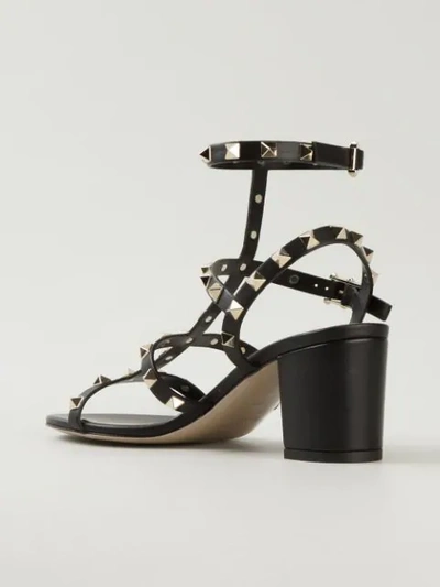 Shop Valentino Rockstud Sandals In Black