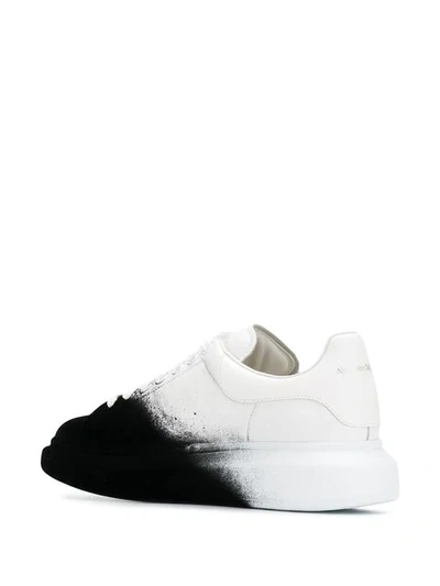 Shop Alexander Mcqueen Oversized Spray Paint Effect Sneakers In White