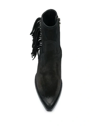 Shop Saint Laurent Lukas Fringed Boots In Black