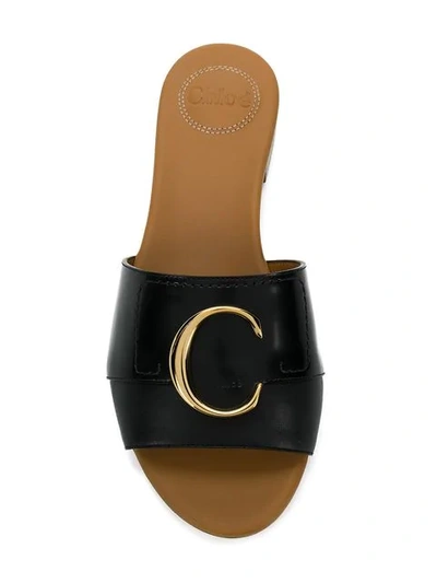 Shop Chloé Logo Plaque Flat Sandals In 001 Black