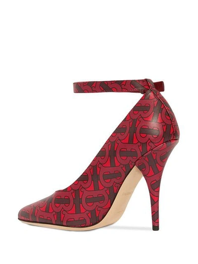 Shop Burberry Triple Stud Monogram Print Leather Point-toe Pumps In Red