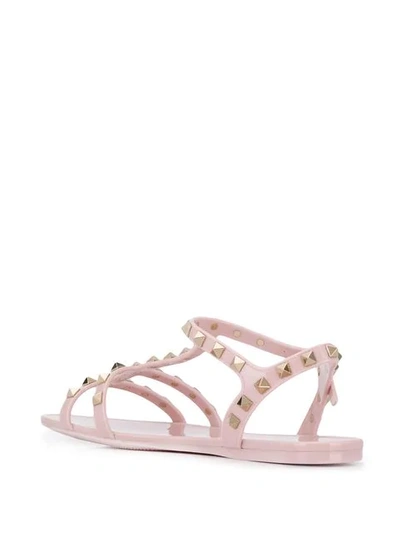 Shop Valentino Rockstud Flat Sandals In Pink