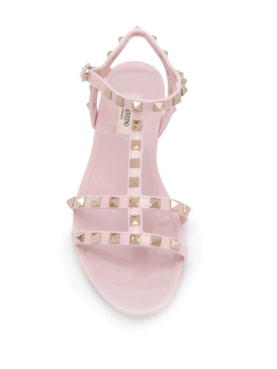 Shop Valentino Rockstud Flat Sandals In Pink