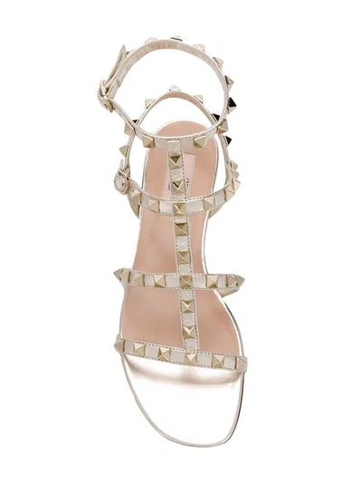Shop Valentino Garavani Rockstud Ankle Strap Sandals In Metallic