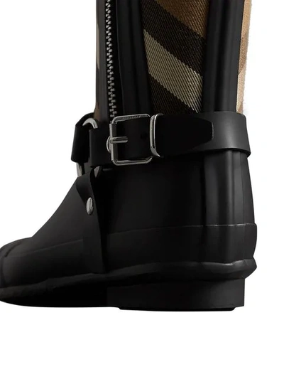 Shop Burberry Buckle And Strap Detail Check Rain Boots In Black