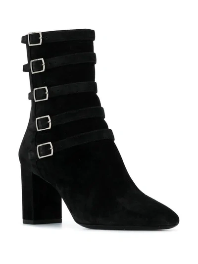 Shop Saint Laurent Lou Buckle Detail Ankle Boots In Black